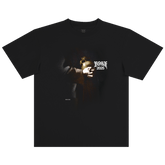The BOSK St. Francis Tee is a black heavy-weight 100% cotton classic fit shirt with a dark image of hands holding a glowing object and “ROSE 2025” in stylized white font, creating a mysterious, dramatic look.
